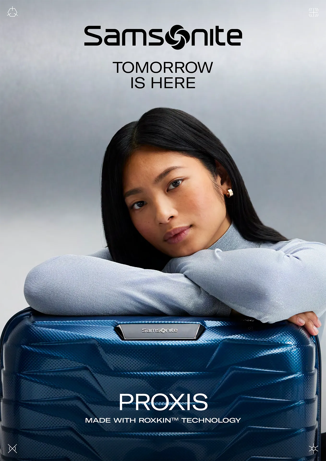 Poster of a young woman with a Samsonite Proxis suitcase in a studio.
